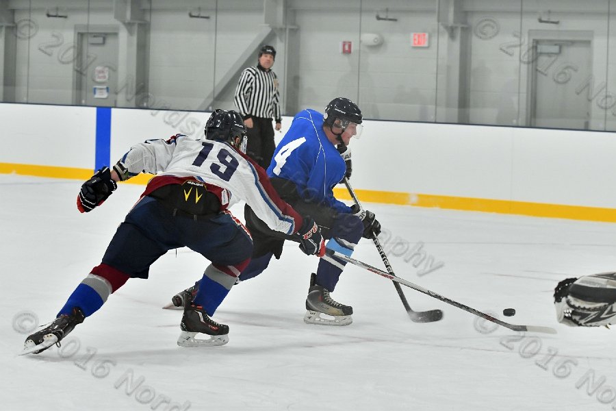 Wheaton College Men\'s Ice Hockey vs Middlesex Community College. - Photo By: KEITH NORDSTROM